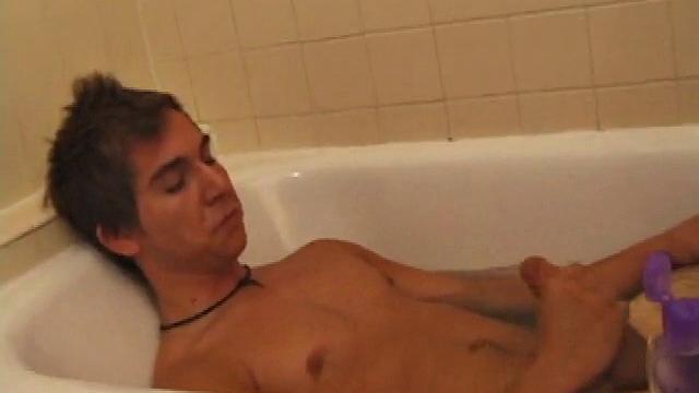 Brock is spending some down time in the bathtub reading a magazine and stroking his cock. After edging himself a few times, it doesn't take long to spew a warm load of cum onto his face.