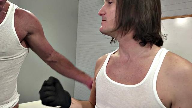 Fisting addict DILF fucked by stud with gloved hands