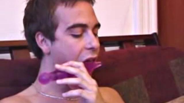 Back from shopping, Vincenzo is anxious to show off his new purchase. He strokes his cock on the sofa, before stripping his clothes off to show us his skater boy bpdy. Vincenzo brings out his new sex toy and begins lubing it up with his mouth.