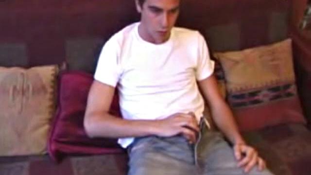 Back from shopping, Vincenzo is anxious to show off his new purchase. He strokes his cock on the sofa, before stripping his clothes off to show us his skater boy bpdy. Vincenzo brings out his new sex toy and begins lubing it up with his mouth.