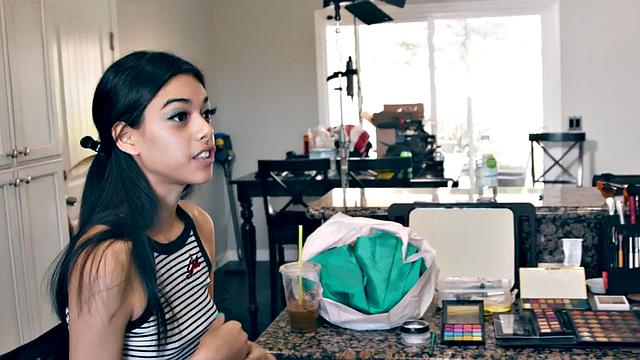 Petite lesbian model licked by gf during photoshoot