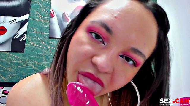 Latina sucking dildo like pro