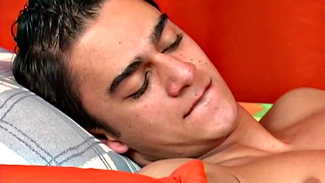 Juano is a skinny Latin twink, who can't wait to get naked, so he can beat off. That big uncut cock is already stiff, by the time his underwear slips off and he quickly gets busy stroking himself.