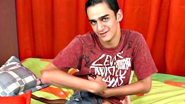 Juano is a skinny Latin twink, who can't wait to get naked, so he can beat off. That big uncut cock is already stiff, by the time his underwear slips off and he quickly gets busy stroking himself.