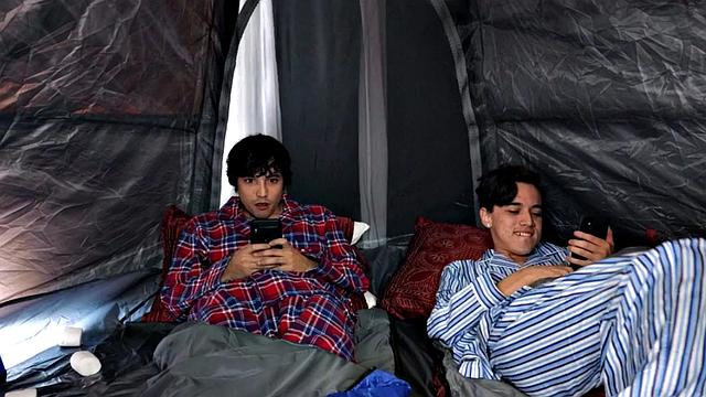 A tattooed MILF get her big tits spitroasted by a group of little guys in a wild threesome