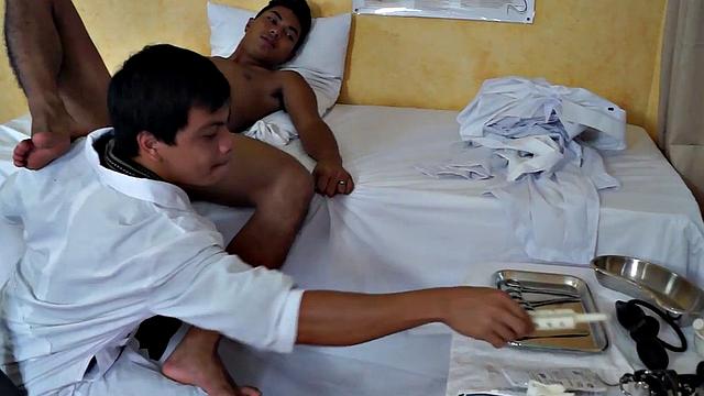 Analtotying Asian doctor fucks skinny twink in office