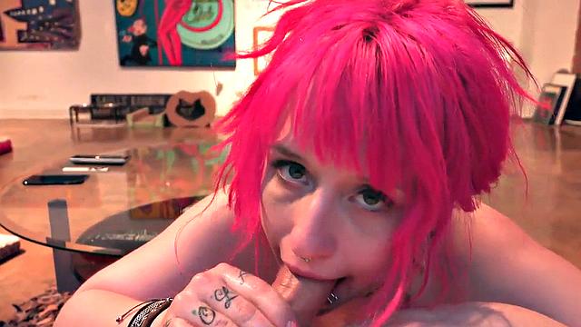 Colored hair babe with big pierced boobs throats in POV