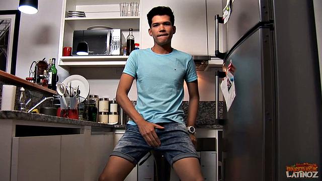 Our featured solo boy of the week is skinny and smooth Cedric. In the kitchen, this young Latino wastes little time stripping naked and giving us a close-up look at his package.