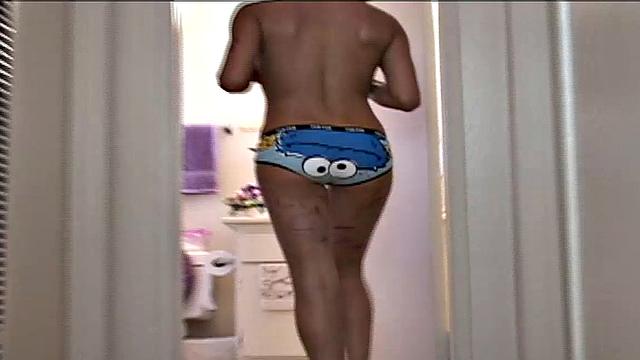 Trixie Teen painted body with medium tits and near pussy. She rubbing her pussy with paint teasing around. She shower showing her naked body POV