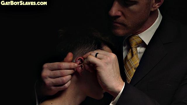 Submissive oiled twink jerked by suited gay DILF