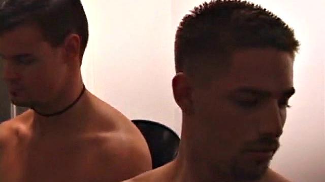 Eight guys lined up stroking like they're competing in the world's weirdest relay
