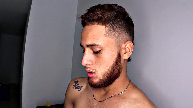 As the clothes hit the floor we discover this bearded red head is a skinny and smooth boy, who quickly gets hard. The young man jerks off his big cock. Then he continues his long stroke show.