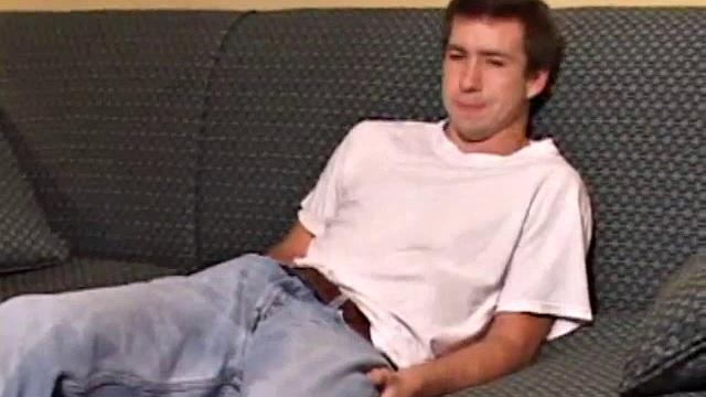 As the video plays, young Donovan Woodside kicks back on a couch and works up a stiff one. Some serious stroking follows, with a little ass play for added stimulation.