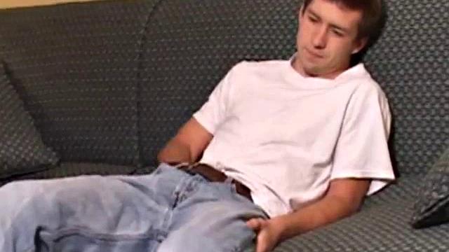 As the video plays, young Donovan Woodside kicks back on a couch and works up a stiff one. Some serious stroking follows, with a little ass play for added stimulation.