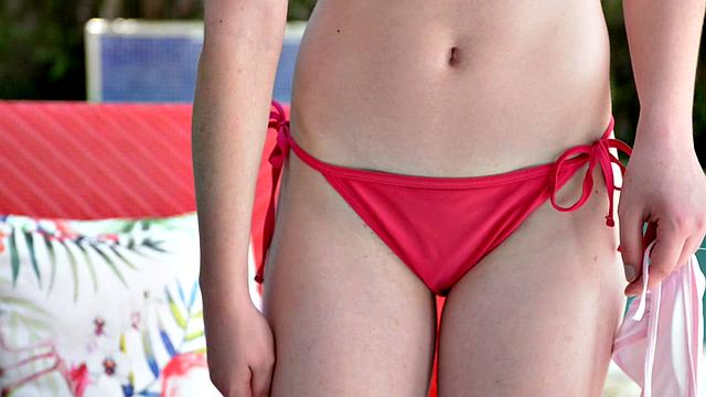 Submissive Maddie cums outside in a bikini.