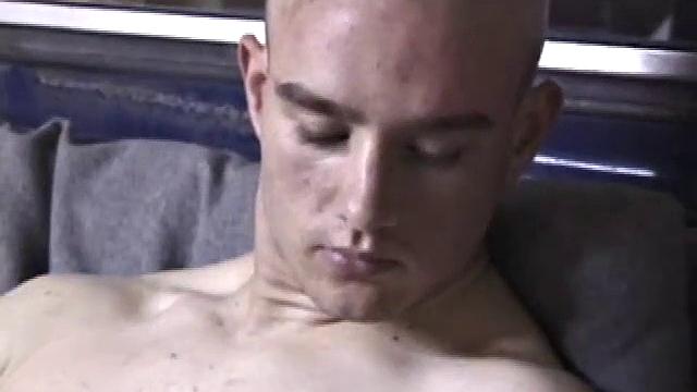 If you like your guys lookin gpretty butch, with lean and lightly muscled bodies, pierced nips, shaved head, Kenny for you. We join him in the back of his pickup truck, parked in a garage.