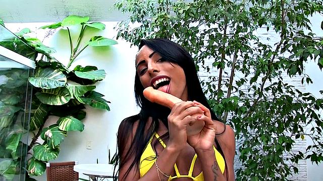 Adrielhy Bronze sits on a dildo