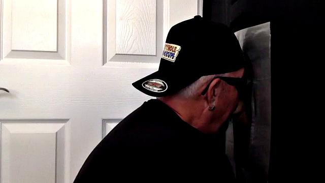 Senior gloryhole amateur blows BF's dick through hole