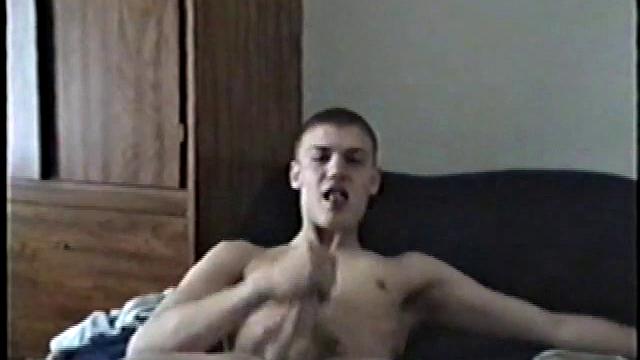 Lance has his stash of magazines next to him, as he strips out of his clothes. This boy enjoys watching himself on the camera's view screen, as much as he likes the magazines alongside him.