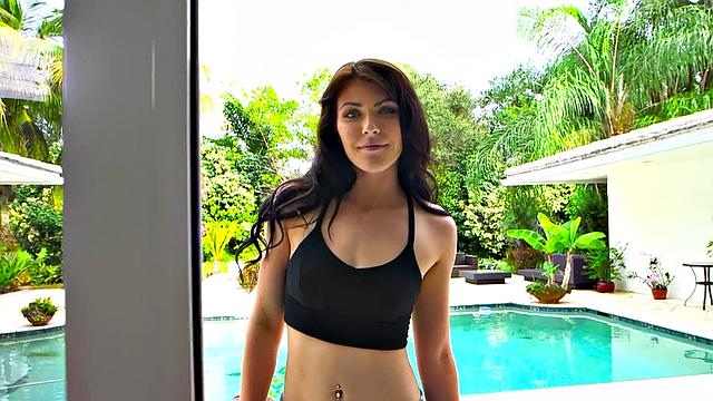 Watch this babe deepthroat and finger her trimmed pussy in high heels and living room