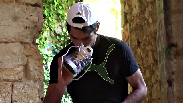 Sneakers and foot fetish guy sucks cock in abandoned place