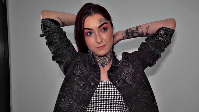 Redhead with tattoos receives doggystyle fuck