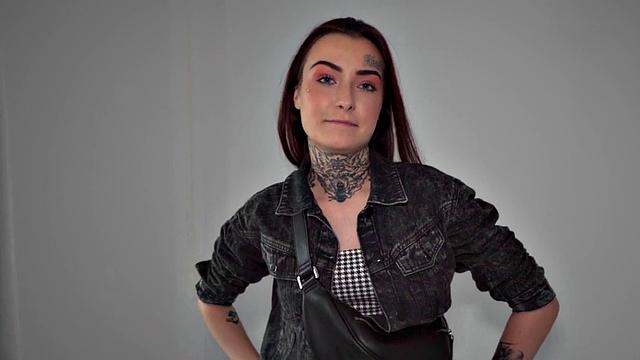 Redhead with tattoos receives doggystyle fuck