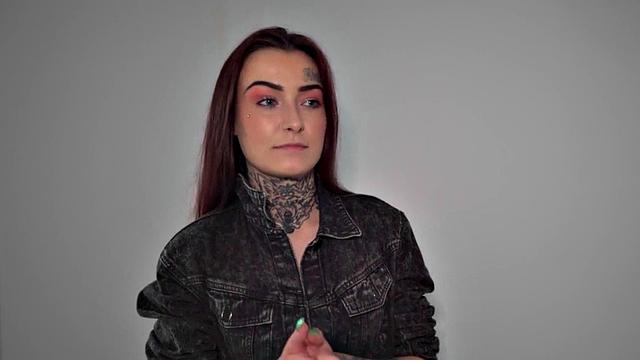 Redhead with tattoos receives doggystyle fuck