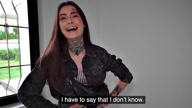 Redhead with tattoos receives doggystyle fuck