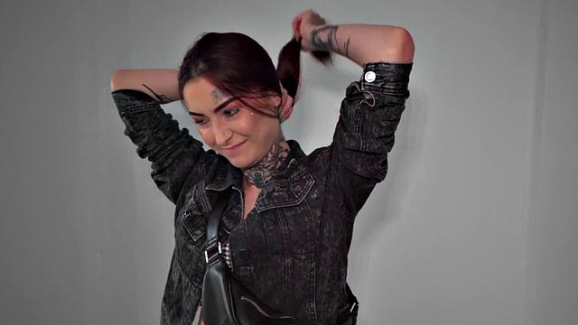 Redhead with tattoos receives doggystyle fuck