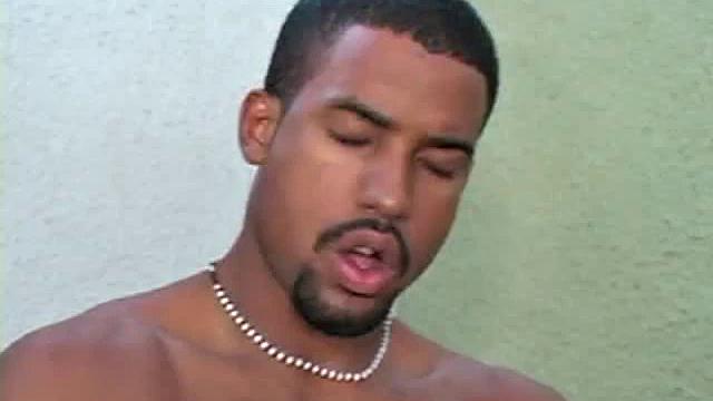 There are four guys in this scene, but over 50 inches of cocks are displayed for the viewer's delight. Two smooth, super-dark hunks take Fernam de Souza's mouth and ass with their gargantuan dicks.