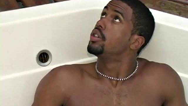 There are four guys in this scene, but over 50 inches of cocks are displayed for the viewer's delight. Two smooth, super-dark hunks take Fernam de Souza's mouth and ass with their gargantuan dicks.