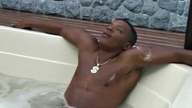 There are four guys in this scene, but over 50 inches of cocks are displayed for the viewer's delight. Two smooth, super-dark hunks take Fernam de Souza's mouth and ass with their gargantuan dicks.