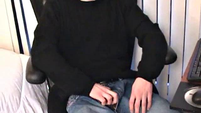 Parked in front of his computer, Darrell works his cock stiff thru his pants, before pulling it out. While watching some porn, he beats off with determination. After a while Darrell grabs and dumps his warm cum into a wine glass.