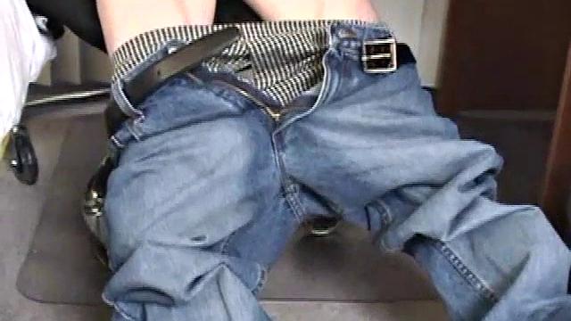 Parked in front of his computer, Darrell works his cock stiff thru his pants, before pulling it out. While watching some porn, he beats off with determination. After a while Darrell grabs and dumps his warm cum into a wine glass.