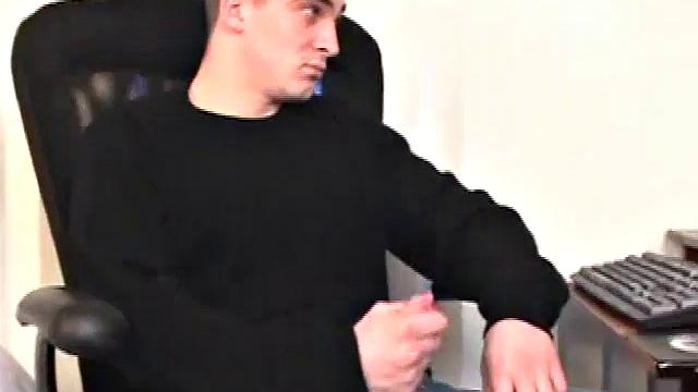 Parked in front of his computer, Darrell works his cock stiff thru his pants, before pulling it out. While watching some porn, he beats off with determination. After a while Darrell grabs and dumps his warm cum into a wine glass.