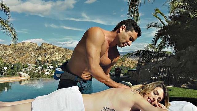 Tattooed shemale oils up and fucks masseur in public pool for a good handjob