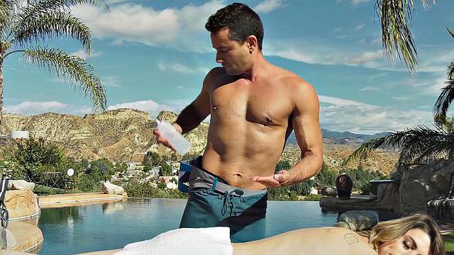 Tattooed shemale oils up and fucks masseur in public pool for a good handjob