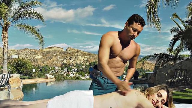 Tattooed shemale oils up and fucks masseur in public pool for a good handjob