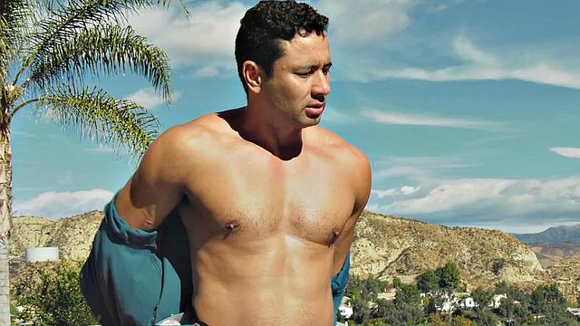 Tattooed shemale oils up and fucks masseur in public pool for a good handjob