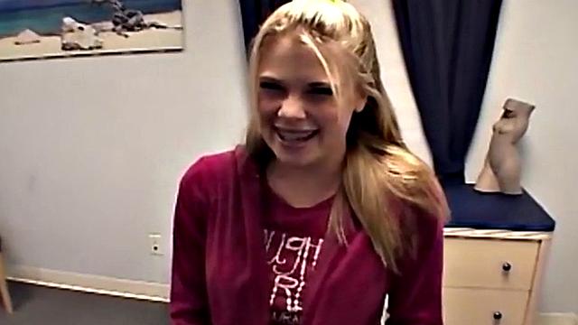 Tiny blonde teen rubbing her pussy