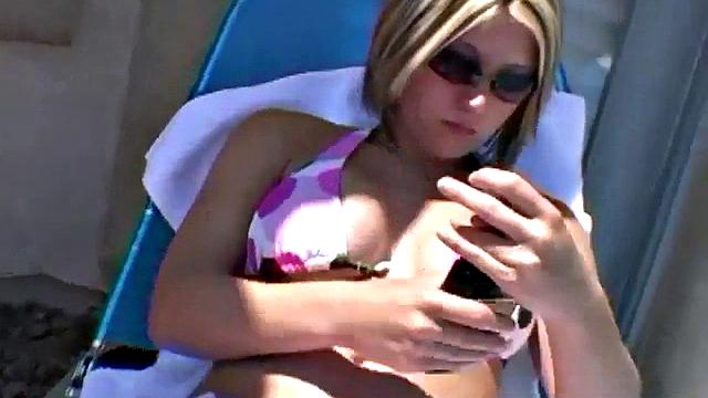 Paige lotions up under the sunshine