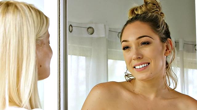 Blonde and brunette lesbians in denim shorts finger and lick each other's trimmed pussies in Paradise Pussy