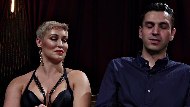 Divine BDSM domina in lingerie pegging with strapon