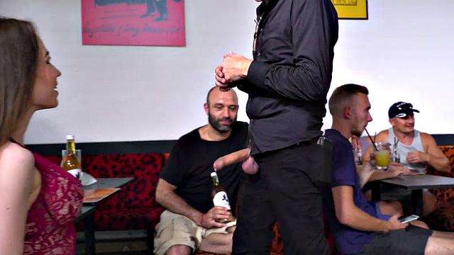 Blonde slut in high heels squirts in a public orgy with voyeurs watching her deepthroat and pussy lick