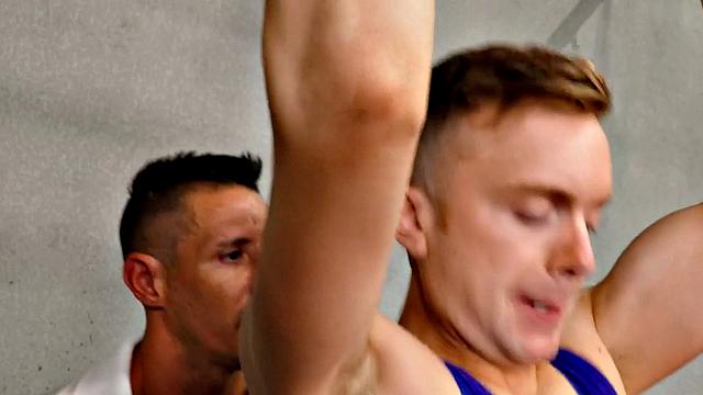 Gym hunk with athletic body fucks stud's asshole bareback