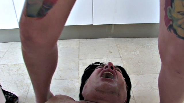 Foot domme worshipped before pissing on submissive