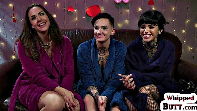 Busty MILFs in latex explore each other's bodies in wild threesome action