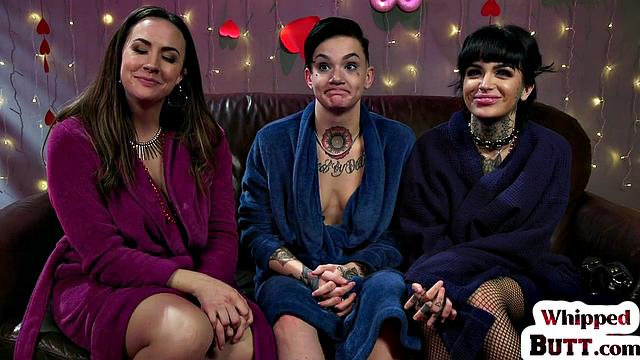 Busty MILFs in latex explore each other's bodies in wild threesome action