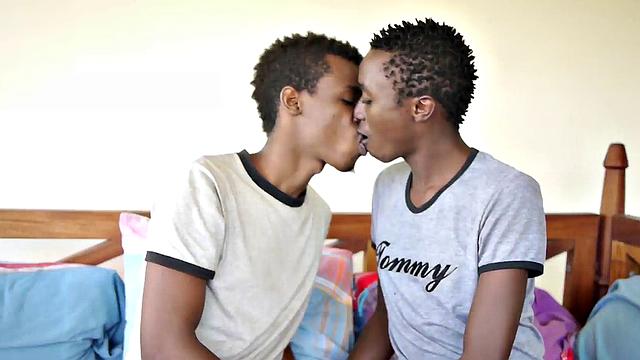 African twink blows partner's uncut dick before bareback sex